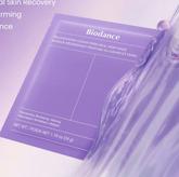 Biodance rejuvenating caviar poren real deep mask packaging on a light purple background