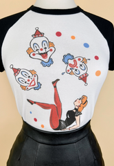 T-shirt with clown illustrations on a beige background