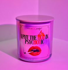 Candle jar with 'I Put the Hot in Psychotic' text and lip graphic on a pink background