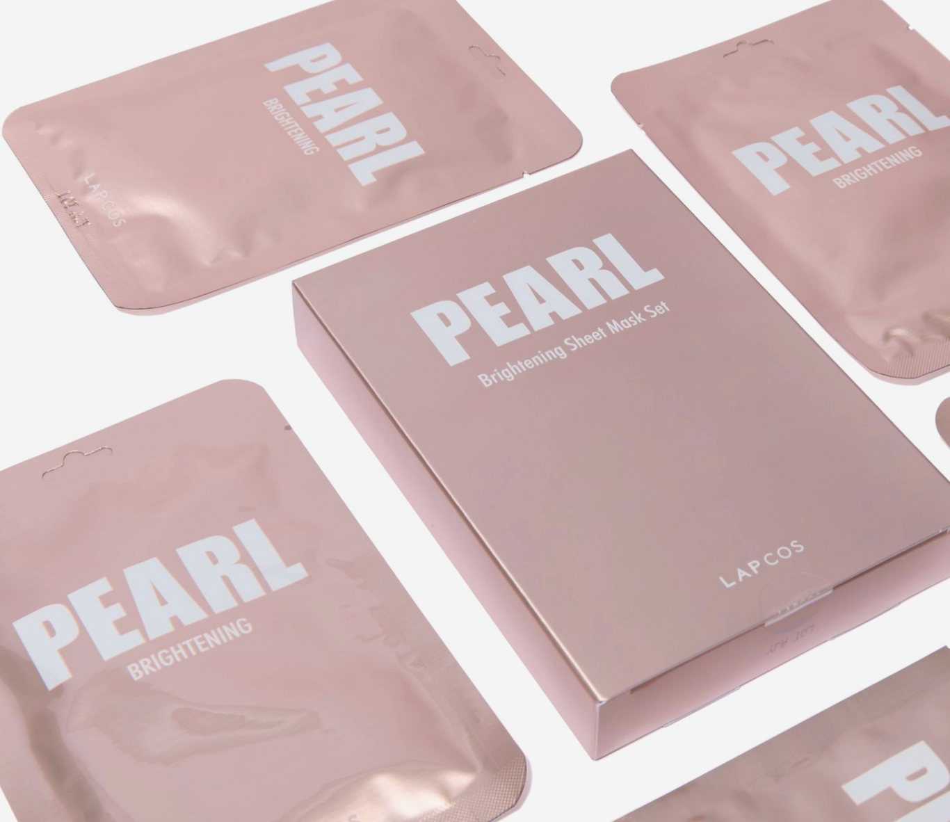 Pearl brightening sheet mask set by LAPCOS with pink packaging and white text.