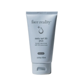 blue tube with daily spf 30 plus and face reality logo