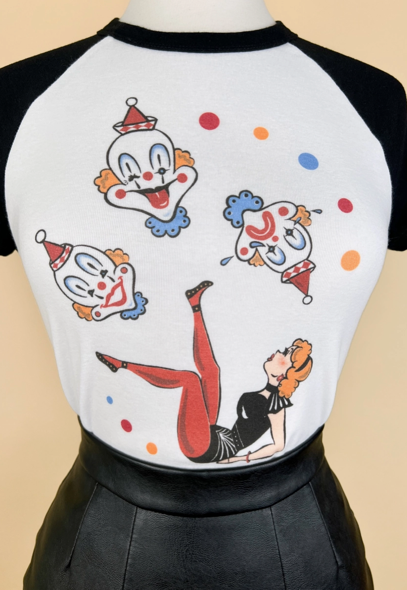 T-shirt with clown illustrations on a beige background
