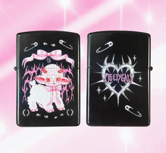Two black lighters with artistic designs on a pink background